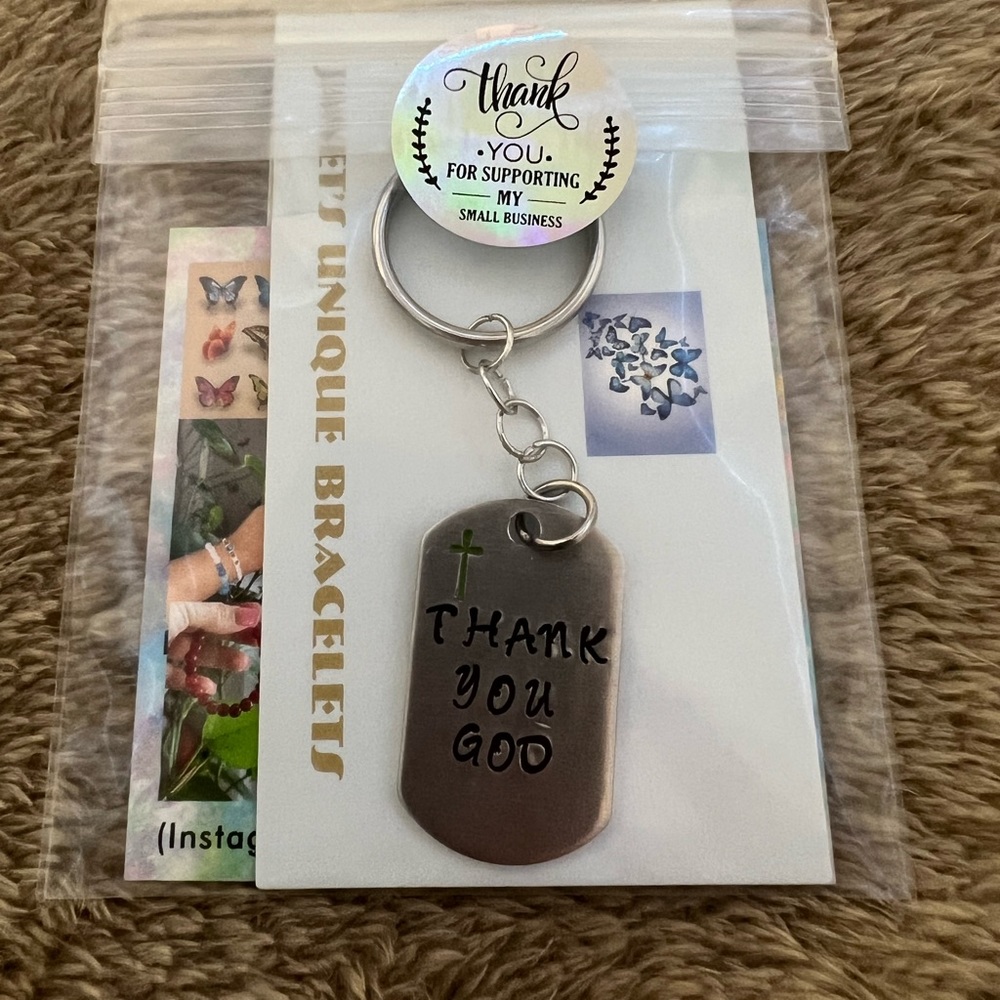 It is a thank you handmade charm, using a hammer and ink